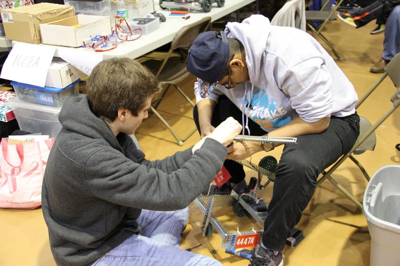 Westlake High School sophomores Matthew Maieli, left, and Brian Thomas put the final touches on their VEX Robotics project. 