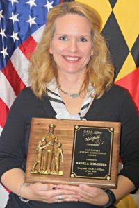 Corporal Angela Delozier receives Sam Walker Lifetime Achievement Award