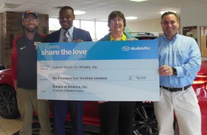 Calvert Meals on Wheels Accepts Check from Waldorf Subaru