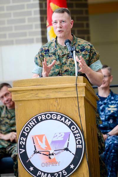 Col. Matthew Kelly delivers remarks as he assumes command of the V-22 Joint Program Office (PMA-275) July 5. Kelly is the 12th program manager for PMA-275. (U.S. Navy Photo)
