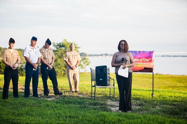 Tracy Hurtt, far right, shares a personal story of her bout with major depressive disorder after deploying to Aghanistan. Hurtt spoke as part of the sixth annual "Light of Day" event Aug. 23 at Patuxent River, Md. (U.S. Navy photo)