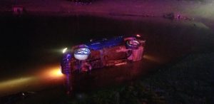 Two Occupants Avoid Injury When SUV Crashes into Pond