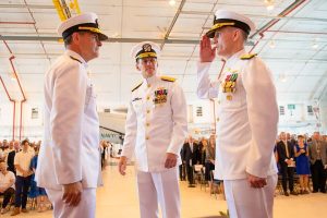 Commander, Naval Air Systems Command Vice Adm. Dean Peters reports to Vice Chief of Naval Operations Adm. Bill Moran following the change of command May 31 at Naval Air Station Patuxent River, Md. (U.S. Navy photo)