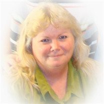 Sharon L. Nielsen, 64