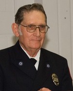 John P. “Chuck” Charles