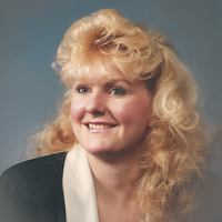 Christine Lorraine “Chris” Komar, 53