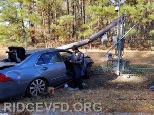 One Injured After Vehicle Strikes Utility Pole and NAS Webster Field Security Fence
