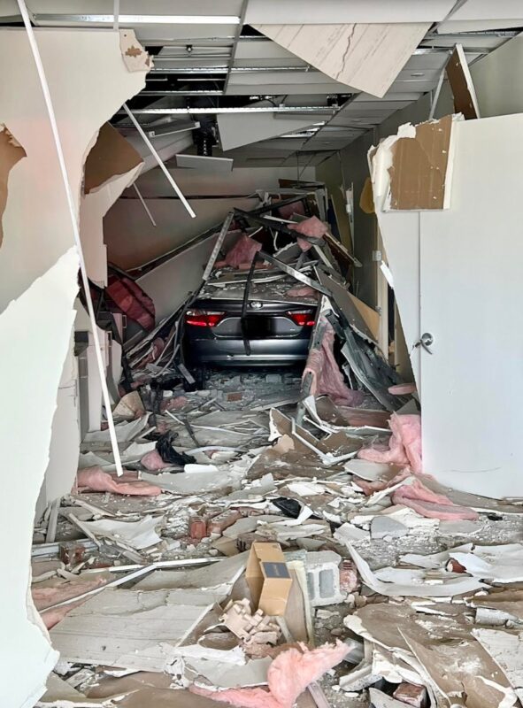 One Transported to Hospital After Vehicle Crashes Into Building in Prince Frederick Shopping Center