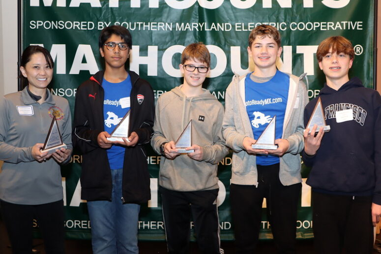 From left, coach Kathy Dempster, Ali Ahmed, Alex Schultz, Logan Oberg, Andrew Bisang