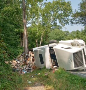 Two Injured After Semi-Truck Overturns in La Plata