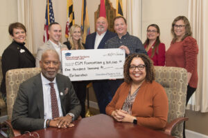 Educational Systems Federal Credit Union Presents CSM Foundation with $100,000