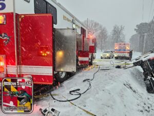 One Transported to Trauma Center After Single Vehicle Flips in Avenue During Snowstorm